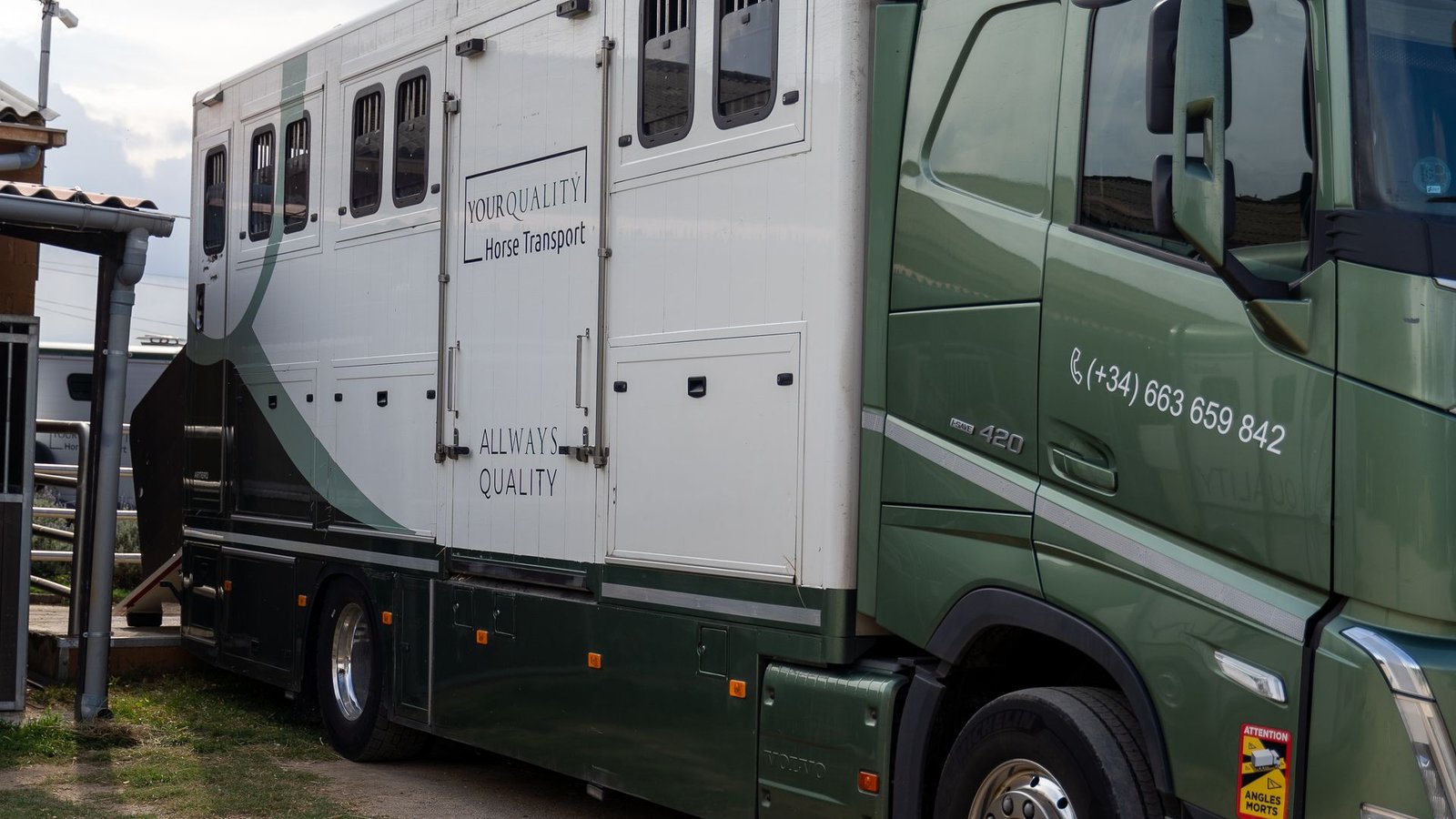 Horse transport lorry with a support van